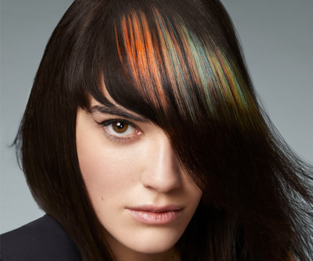 A woman with colorful hair and the lightwaves technique