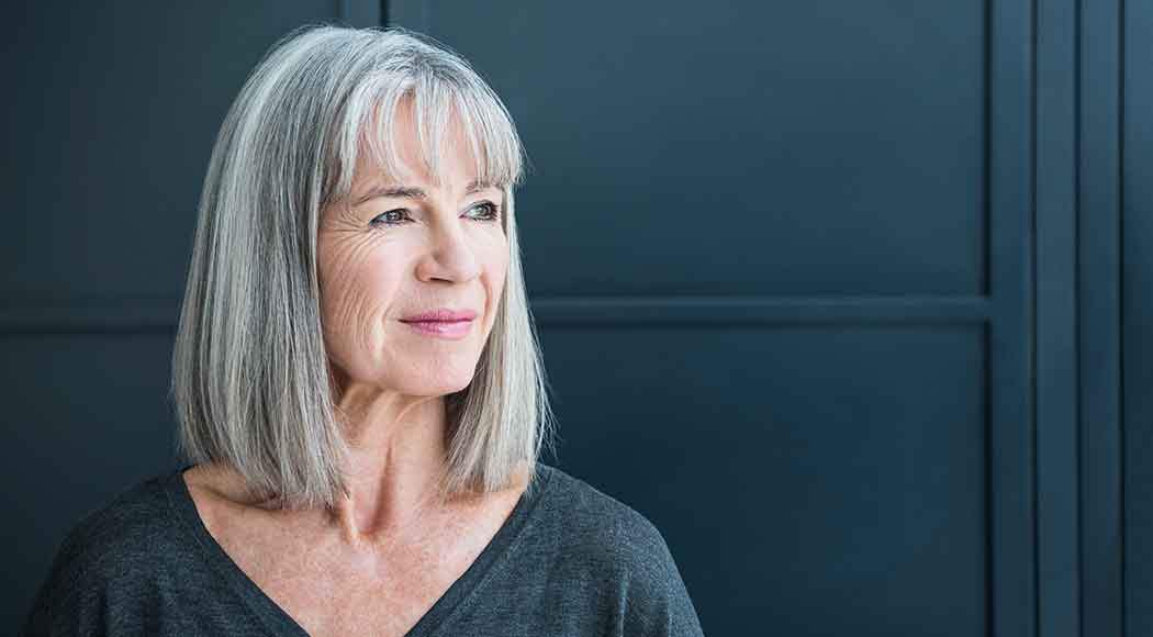 For those of us flaunting natural gray hair, these are exciting times. Gray hair is increasingly popular and is considered a sleek and trendy style that you’ll want to show off with pride regardless of your age. To help bring out the natural beauty in gray hair, there are countless hair care options—from nourishing treatments to toning shampoos, conditioners, and low-commitment color products. Keeping gray hair looking beautiful, bright, and shiny for your clients requires you to know which products and techniques are best suited for each person that comes into your salon. Below, we’re covering the top recommendations for hair professionals. Tips for Analyzing Your Clients’ Gray Hair There are many factors that can affect a client’s overall hair quality, especially if it’s naturally gray. It’s important to take a close look at your client’s hair when deciding on the best type of service to provide. Additionally, you’ll also want to take some time to discuss their hair goals, current routine, and past treatments. Let's take a closer look at some of the key factors to pay attention to when working with gray hair. Percentage of Gray Hair The first step when analyzing gray hair is to take a quick glance at the person’s hair to assess how much gray hair they have. Take notice if they are almost completely gray or if a small number of grays are just beginning to appear. As a general rule, gray hair tends to appear first in the areas near the temples or around the perimeter of the hairline. The percentage of gray hair will help you decide on the right steps to take, as well as which shine-boosting products to use to help them achieve their desired look. Thickness of Gray Hair Believe it or not, not all gray hair is created equally, as some strands are thicker than others. Natural gray hair can vary in texture and thickness, ranging from thick curls to very fine straight hair. By analyzing your client's hair thickness, you can better utilize hair products for gray hair and offer a personalized service that’s most suitable for each strand. 