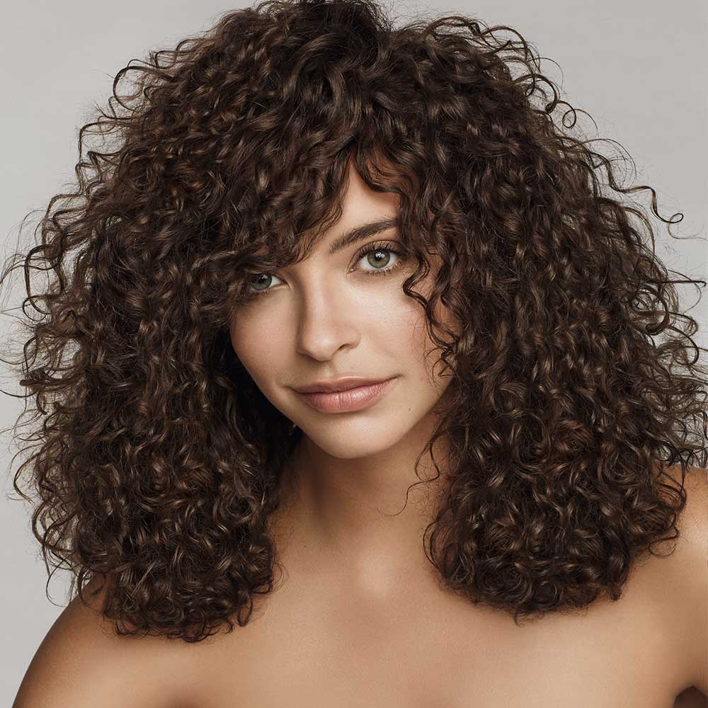 A woman with curly hair