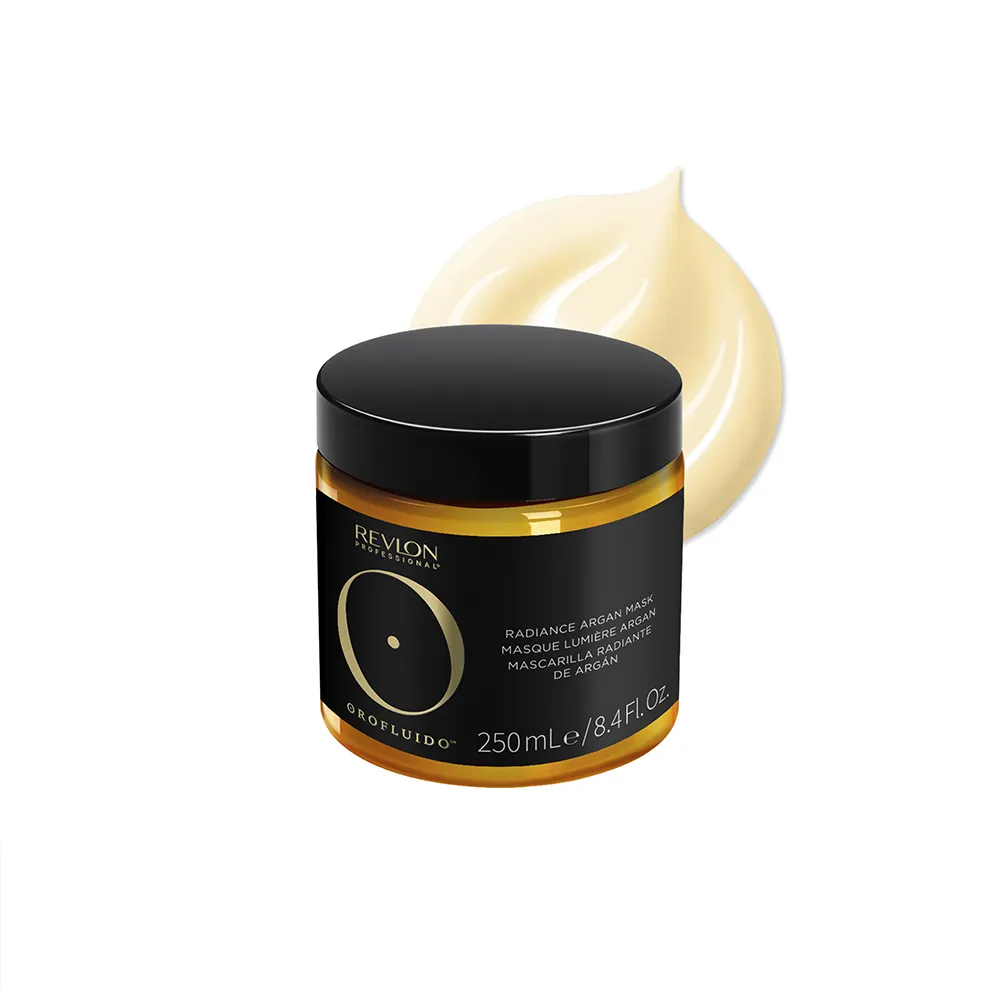 A picture of the Orofluido Radiance Argan Mask with the vegan formula and recycled packaging certifications above it.
