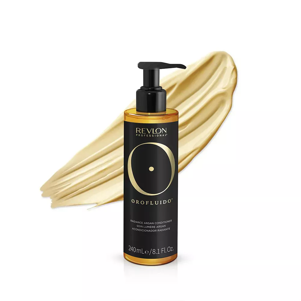 A picture of the Orofluido Radiance Argan Conditioner with the vegan formula and recycled packaging certifications above it.