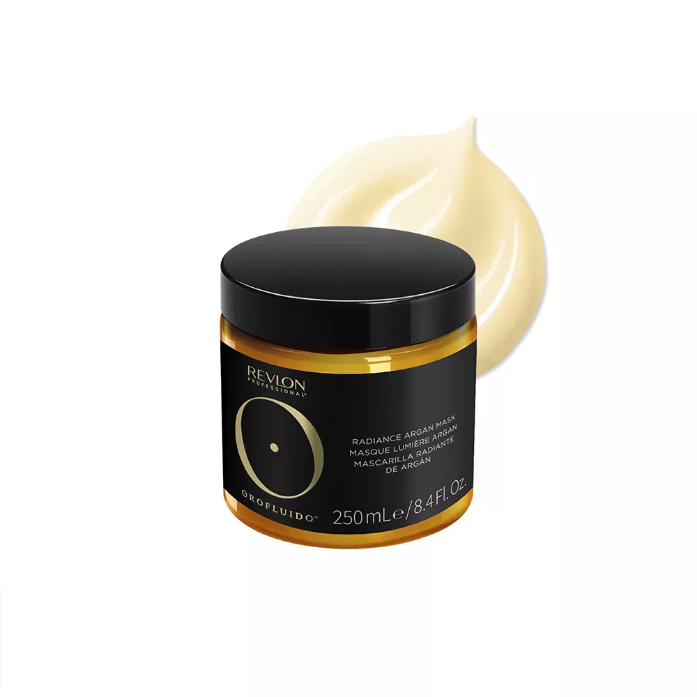 A picture of the Orofluido Radiance Argan Mask with the vegan formula and recycled packaging certifications above it.