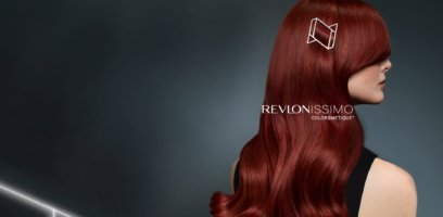 A woman with vibrant hair color after a service with Revlonissimo Colorsmetique™