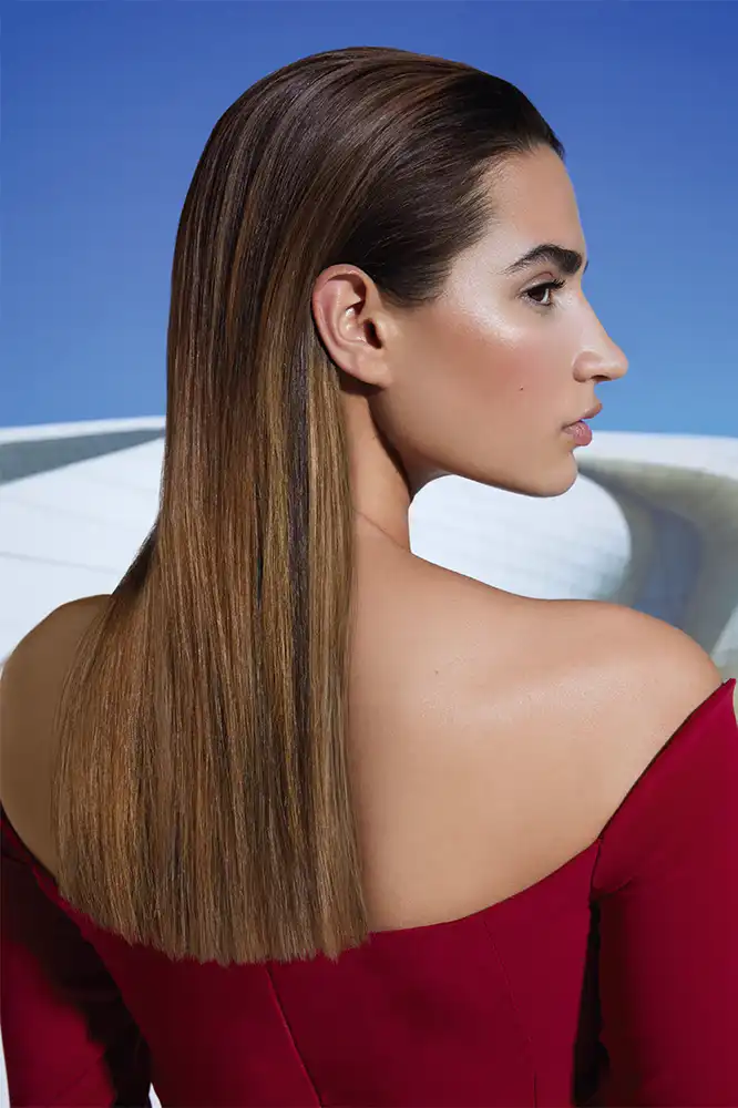 A model from the Fluid Collection with a Bronzite balayage look. 