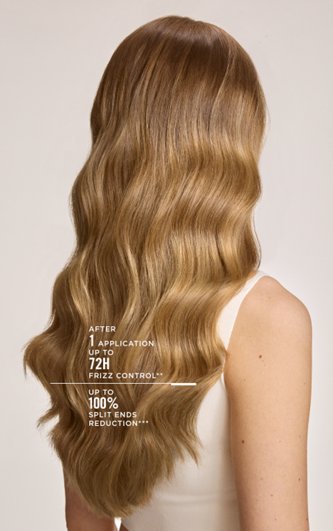 Woman with long wavy dirty blond hair