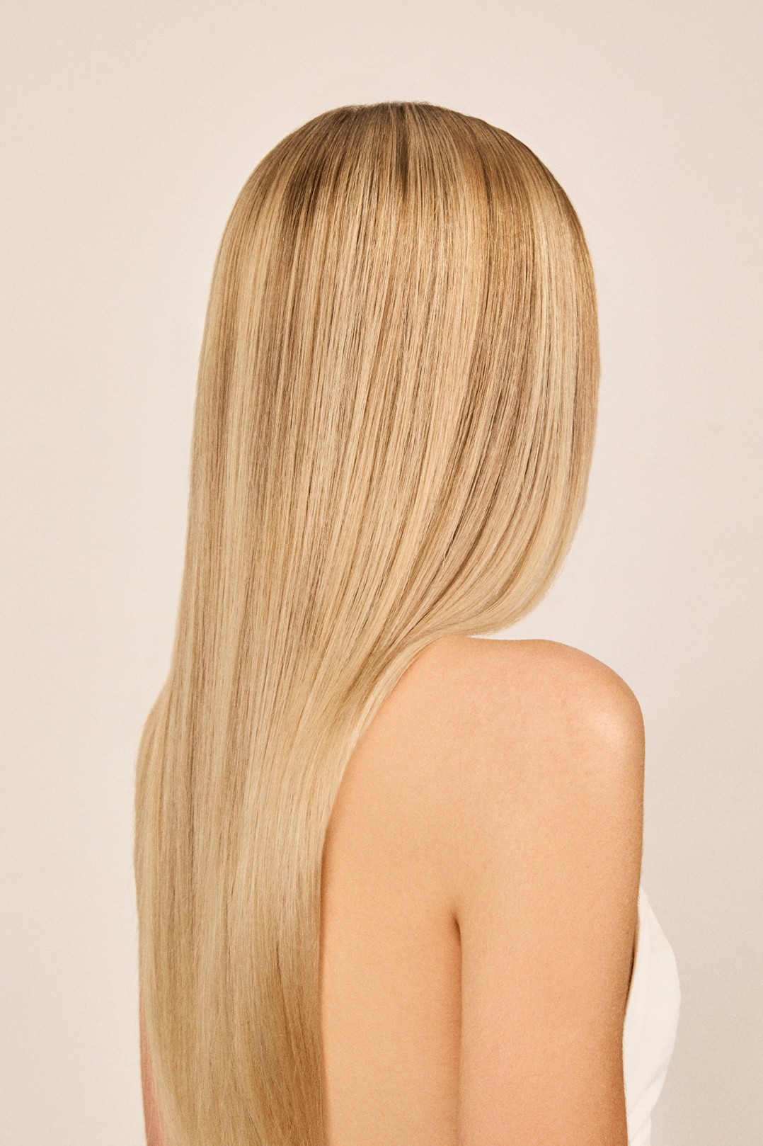 Woman with long, straight blond hair