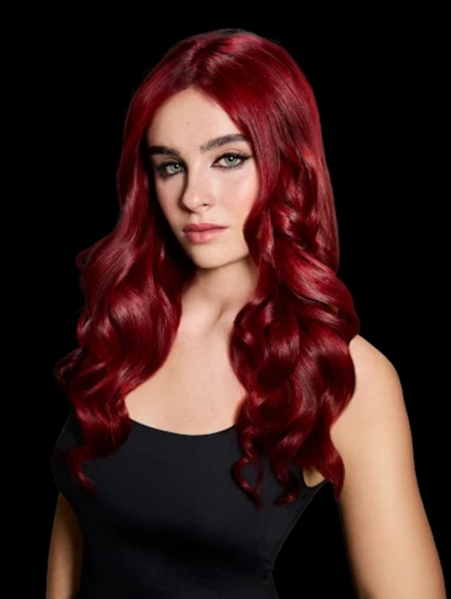  A model wearing shade 66.66 Bold Crimson Red, Revlon Professional’s 2026 Hair Color of the Year