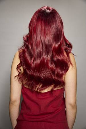 Long wavy Bold Crimson Red hair on a model